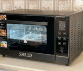 بهترین توستر دیجیتال سوپرلوکس دارای فن کانوکشن شیشه دوجداره 60لیتر دارای شلف استیک لامپ دوسینی فول امکانات توری میوه خشکن