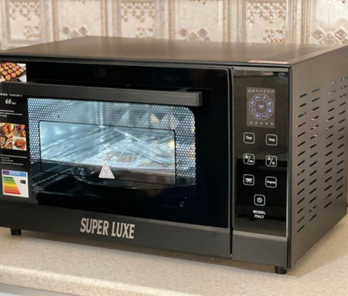 بهترین توستر دیجیتال سوپرلوکس دارای فن کانوکشن شیشه دوجداره 60لیتر دارای شلف استیک لامپ دوسینی فول امکانات توری میوه خشکن